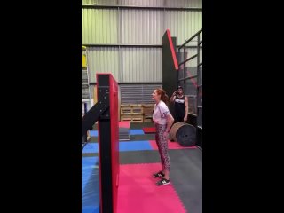 girl goes through an obstacle course